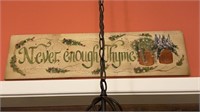 Handpainted sign on Wood that reads “never enough