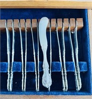 12 Butter knives , sterling silver by Reed &
