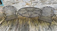 Metal patio table with matching chairs