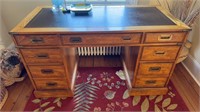 7 drawer wood work desk, with brown leather top,