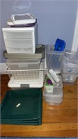 Collection of empty storage bins, most without