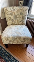 Floral upholstered comfy reading chair, with