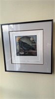 Small framed raven with a rock engraving, number