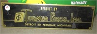 Turner Bros. Inc. brass sign. Measures 4" H x