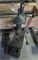 Bench top drill press without motor and 6" vise.