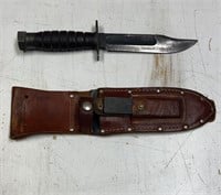Knife includes sheath and sharpening block
