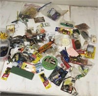Mixture of assorted fishing lures, string