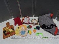 Pot holders, chalkware wall hangings, and a bag