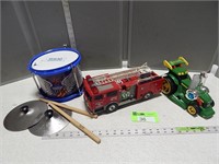 Toy John Deere tractor, a fire truck and drum and