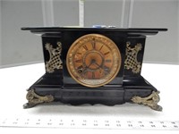 Ansonia Clock Co. iron clock with key; per seller