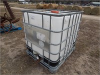 250 Gallon poly tank in a galvanized pallet cage