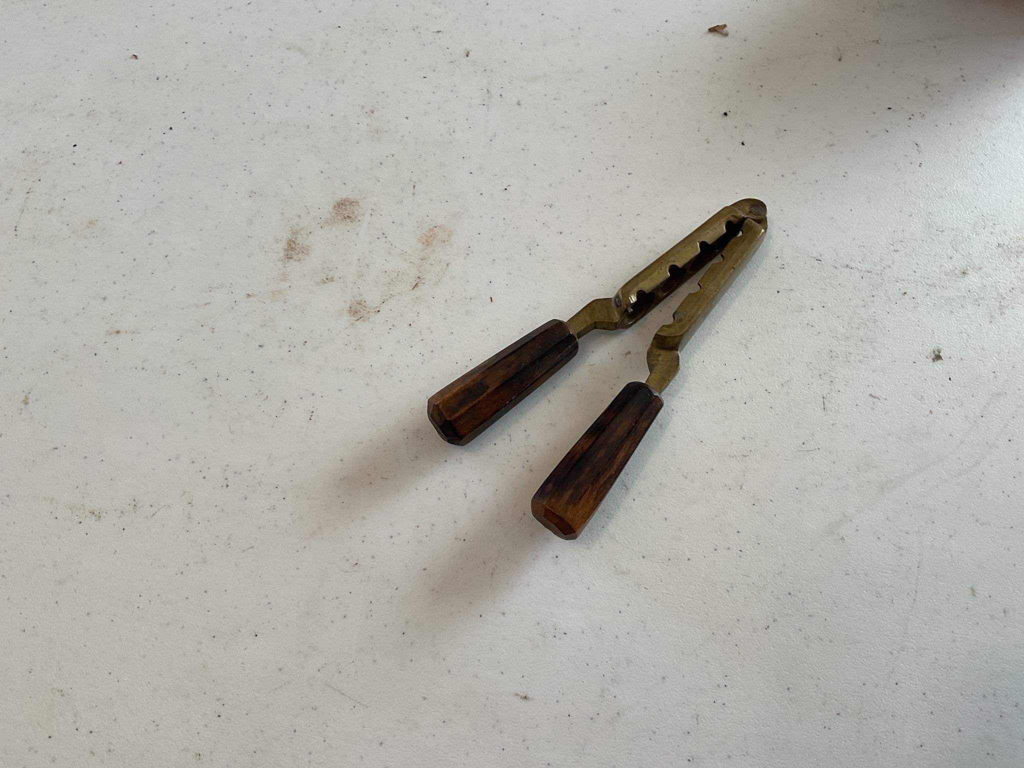Antique brass bullet mold