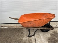 Orange metal wheelbarrow