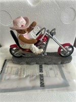 Bear riding motorcycle figurine