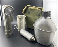 Military canteen, flashlight, pieces