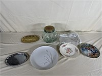 Three plates two trays, one large jar