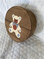 Vintage wooden cheese box with teddy bear