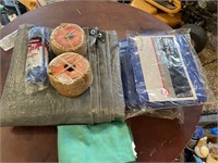 Assorted tarps , aprons and rope