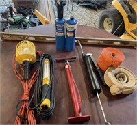 Assortment of lights, level ,propane canisters,