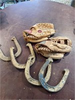 Baseball gloves  and  horseshoes