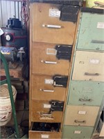 Five drawyer filing cabinet with contents