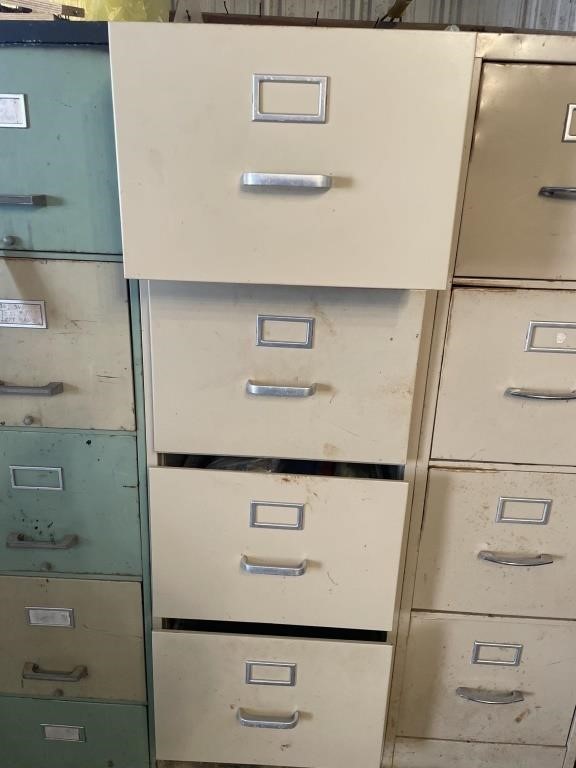 Four drawyer   filing cabinet and contents