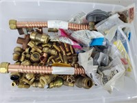 Tote of brass fittings