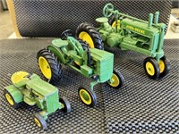 Three John Deere Tractors-Cast iron