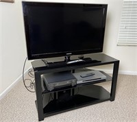 SAMSUNG 40" TV, ENTERTAINMENT STAND AND MORE!