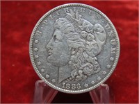 1883 Morgan Silver US dollar coin.