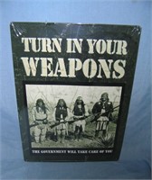 Turn in your weapons all tin advertising sign