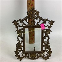 Ornate metal cast iron picture frame with stand