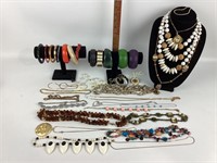 Costume jewelry bracelets, necklaces, bangle