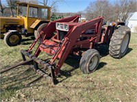 International 684 tractor with a case