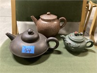 (3) teapots