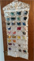 63+/- Assorted Thread Spools in Hanger Bag