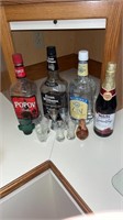 Assorted shot, glasses, and bottle collection