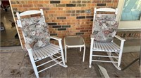 (2) wooden rocking chairs, and small metal table