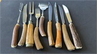 Nine. Antler handle, knives and serving forks,