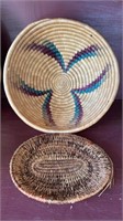 Two American Indian woven baskets, one circular