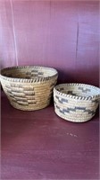 Two woven African baskets, one is 5 inches in