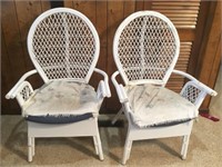 Two wooden wicker chairs