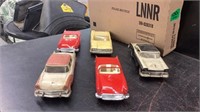 5 plastic model cars