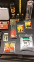 Assortment of different gun cleaners and other