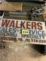 Walkers, sales and service sign