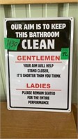 Sign our Aim is to keep this bathroom Clean