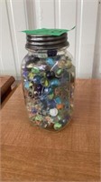 Glass jar and marbles