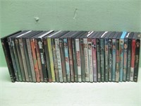 Thirty-Four Assorted DVD'S Shown