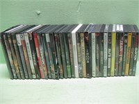 Thirty-Four Assorted DVD'S Shown