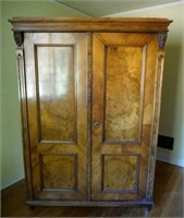 Vintage carved wood armoire